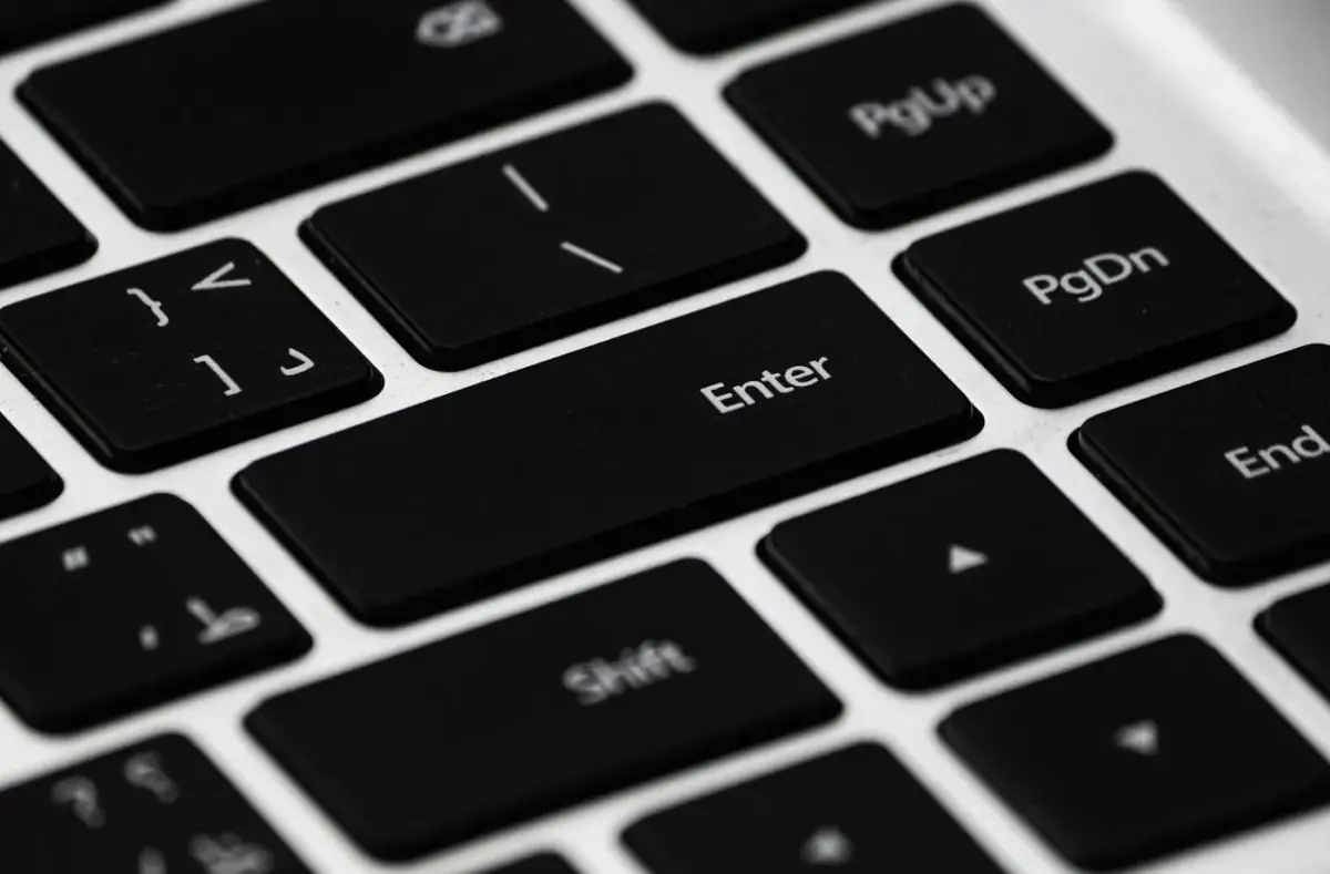 Close-up of laptop keyboard and touchpad area