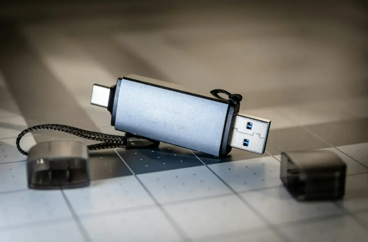 Close-up of a USB flash drive on a desk