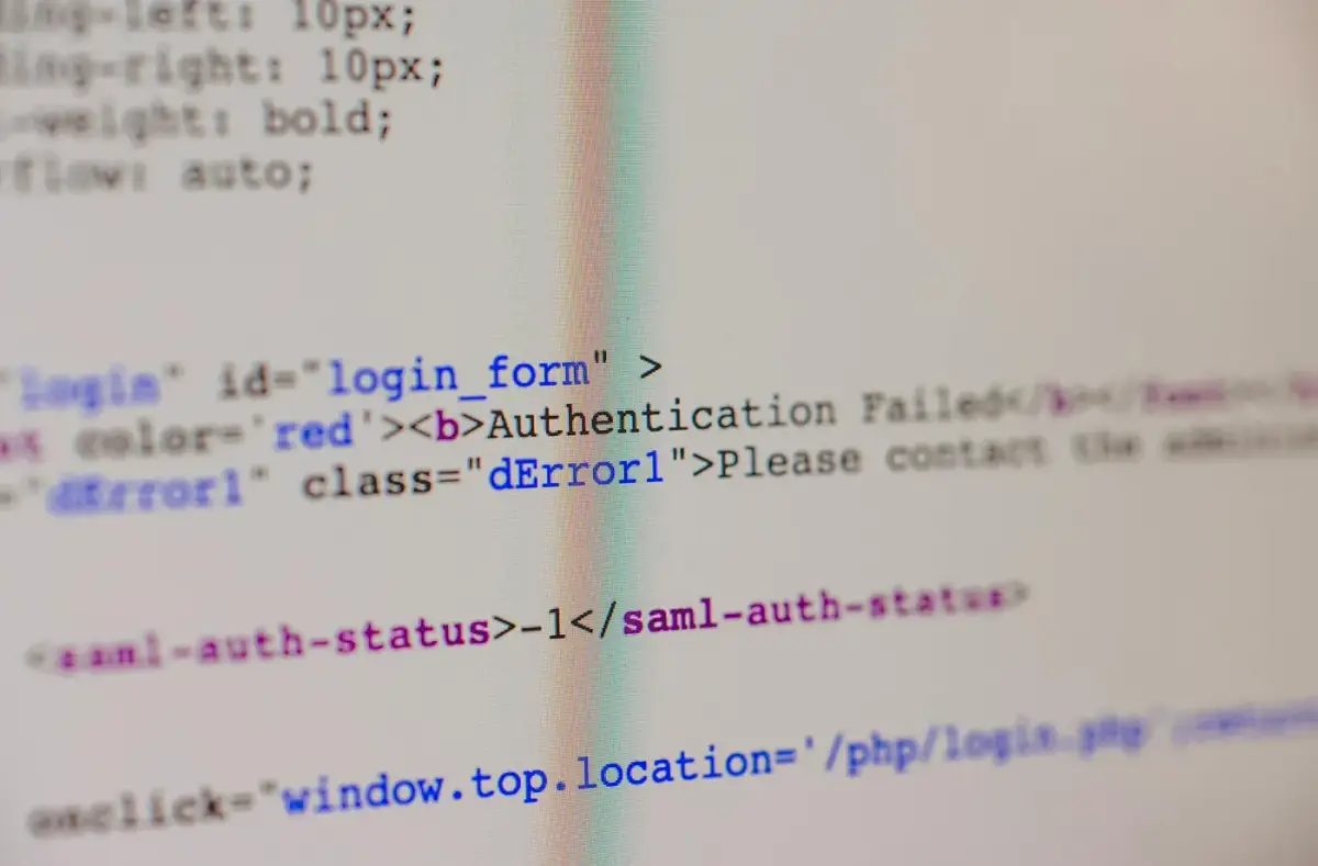 Computer screen showing technical code and status text