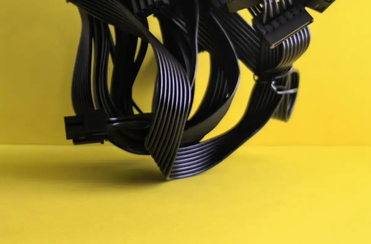 Desktop power supply cables on a work surface